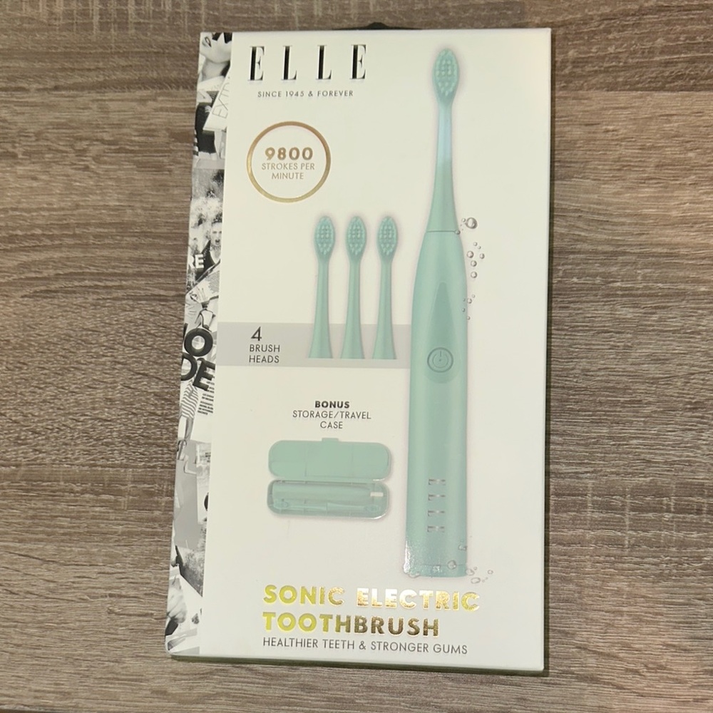 ELLE Sonic Electric Toothbrush & 4 Brush Heads/ New in the box